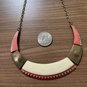 Ladies’ broach style necklace as shown with accompanying plain earrings. NWT.